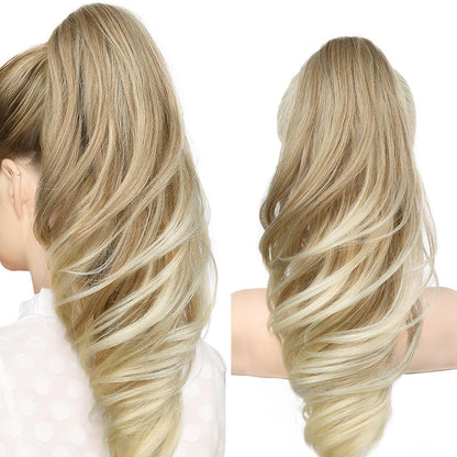Grab the ponytail and twist the hair into a long, curly, wavy ponytail.