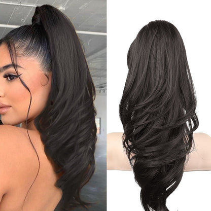 Grab the ponytail and twist the hair into a long, curly, wavy ponytail.