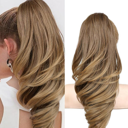 Grab the ponytail and twist the hair into a long, curly, wavy ponytail.