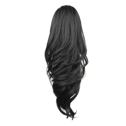 Grab the ponytail and twist the hair into a long, curly, wavy ponytail.